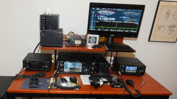 HF operating position, Icom IC-7610, Icom IC-7300, IC-9700. Click for larger image.